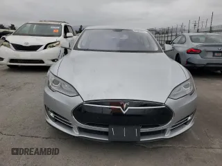 2014 Tesla Model S 60 with VIN 5YJSA1H14EFP34335, listed as a Copart auction lot 65504325 with Not provided miles and Clean title. Bid and sale history available at DreamBid. Image 5.