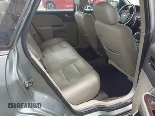 2008 Ford Taurus SEL with VIN 1FAHP24W18G159322, listed as a IAAI auction lot 42144590 with 163,397 mi miles and . Bid and sale history available at DreamBid. Image 8.