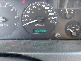 2004 Jeep Grand Cherokee Laredo with VIN 1J4GX48N24C334983, listed as a IAAI auction lot 42522088 with 169,793 mi miles and . Bid and sale history available at DreamBid. Image 7.