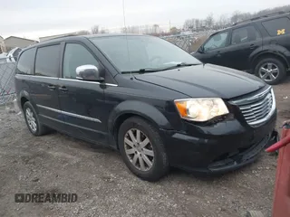 2011 Chrysler Town & Country Touring L z VIN 2A4RR8DG9BR733962, wystawiony jako IAAI lot #40961760 z przebiegiem 126 741 mil mil oraz . Historia ofert i sprzedaży dostępna na DreamBid. Obrazek 1.