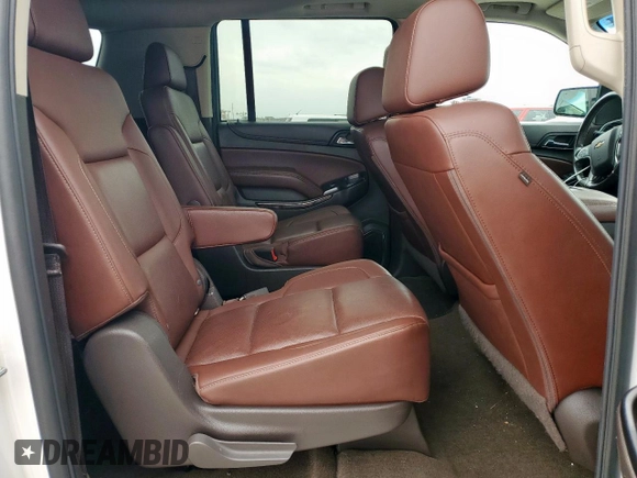 2018 Chevrolet Suburban Premier with VIN 1GNSCJKC5JR184384, listed as a Copart auction lot 53512255 with 161,503 mi miles and Salvage title. Bid and sale history available at DreamBid. Image 11.