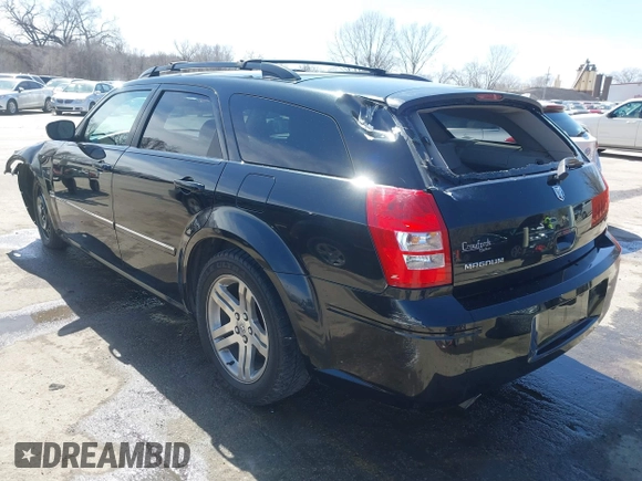 2005 Dodge Magnum RT with VIN 2D4GV58205H610425, listed as a IAAI auction lot 41840499 with 202,786 mi miles. Bid and sale history available at carsss.com. Image 3.