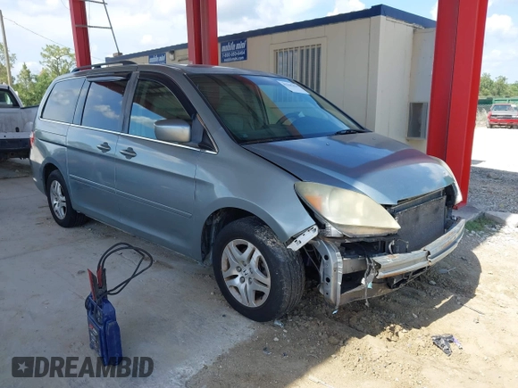 2007 Honda Odyssey EX-L z VIN 5FNRL38657B116038, wystawiony jako IAAI lot #42365429 z przebiegiem 177 518 mil mil oraz . Historia ofert i sprzedaży dostępna na DreamBid. Obrazek 1.