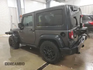 2017 Jeep Wrangler Willys Wheeler with VIN 1C4AJWAG9HL696710, listed as a Copart auction lot 88744905 with 66,800 mi miles and Salvage Title. Bid and sale history available at DreamBid. Image 2.