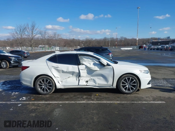2015 Acura TLX V6 Tech with VIN 19UUB3F58FA002616, listed as a IAAI auction lot 41540955 with 91,956 mi miles. Bid and sale history available at carsss.com. Image 13.
