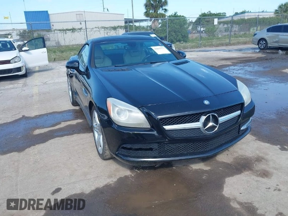 2013 Mercedes-Benz SLK 250 z VIN WDDPK4HA5DF059891, wystawiony jako IAAI lot #42015777 z przebiegiem 79 255 mil mil oraz . Historia ofert i sprzedaży dostępna na DreamBid. Obrazek 1.