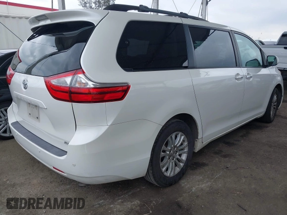 2015 Toyota Sienna XLE with VIN 5TDYK3DC5FS640102, listed as a IAAI auction lot 41885194 with 119,972 mi miles. Bid and sale history available at carsss.com. Image 4.