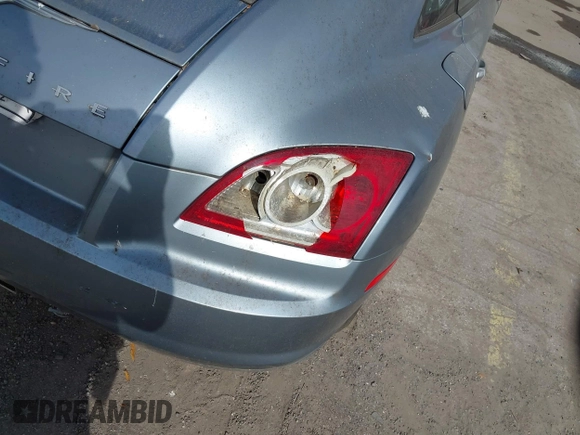 2005 Chrysler Crossfire Limited z VIN 1C3AN69L25X035065, wystawiony jako IAAI lot #41725853 z przebiegiem 64 156 mil mil oraz . Historia ofert i sprzedaży dostępna na DreamBid. Obrazek 12.