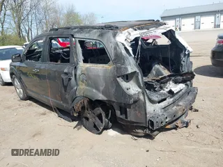 2012 Dodge Journey SXT with VIN 3C4PDDBG3CT297633, listed as a IAAI auction lot 42056704 with 188,000 mi miles and . Bid and sale history available at DreamBid. Image 3.