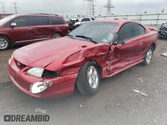 1997 Ford Mustang with VIN 1FALP4040VF166533, listed as a Copart auction lot 66524354 with 71,082 mi miles and Salvage Title. Bid and sale history available at carsss.com. Image 1.