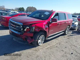 2021 GMC Yukon XL SLT with VIN 1GKS2GKD6MR144038, listed as a IAAI auction lot 41104213 with 98,318 mi miles. Bid and sale history available at carsss.com. Image 2.