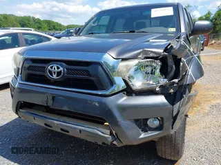 2014 Toyota Tacoma with VIN 5TFLU4ENXEX103129, listed as a IAAI auction lot 42230976 with 191,982 mi miles and . Bid and sale history available at DreamBid. Image 18.