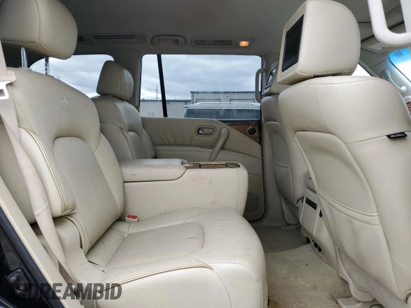 2012 Infiniti QX56 7-passenger z VIN JN8AZ2NE5C9021621, wystawiony jako Copart lot #53484825 z przebiegiem 139 453 mil mil oraz Szkoda całkowita • Salvage title. Historia ofert i sprzedaży dostępna na DreamBid. Obrazek 11.
