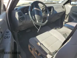 2003 Ford F-150 XL with VIN 1FTRX07W03KD12910, listed as a Copart auction lot 57864555 with Not provided miles and Salvage title. Bid and sale history available at DreamBid. Image 8.