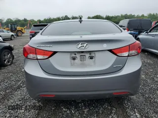 2013 Hyundai Elantra GLS z VIN KMHDH4AE0DU694906, wystawiony jako Copart lot #61286785 z przebiegiem 145 020 mil mil oraz Czysty tytuł • Clean title. Historia ofert i sprzedaży dostępna na DreamBid. Obrazek 6.