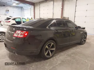 2015 Ford Taurus SEL with VIN 1FAHP2H80FG133240, listed as a IAAI auction lot 41897873 with 189,059 mi miles. Bid and sale history available at carsss.com. Image 4.