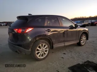 2014 Mazda CX-5 Grand Touring with VIN JM3KE4DY9E0366667, listed as a Copart auction lot 88707365 with 140,115 mi miles and Salvage Title. Bid and sale history available at carsss.com. Image 3.