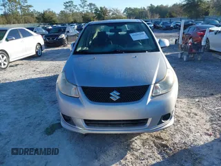 2010 Suzuki SX4 with VIN JS2YC5A46A6310134, listed as a IAAI auction lot 41696108 with 147,059 mi miles and . Bid and sale history available at DreamBid. Image 12.