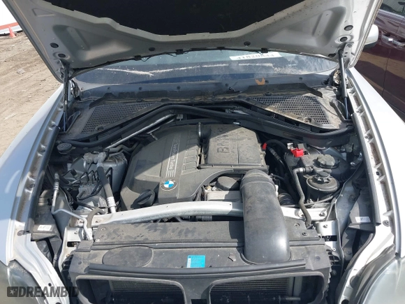 2011 BMW X5 35i with VIN 5UXZV4C53BL403476, listed as a IAAI auction lot 41820844 with 104,472 mi miles. Bid and sale history available at carsss.com. Image 10.