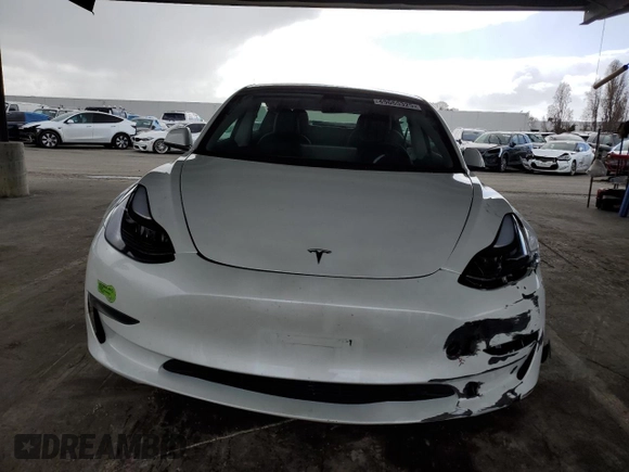 2023 Tesla Model 3 with VIN 5YJ3E1EA7PF488316, listed as a Copart auction lot 49655325 with 60,589 mi miles and Salvage Title. Bid and sale history available at DreamBid. Image 5.
