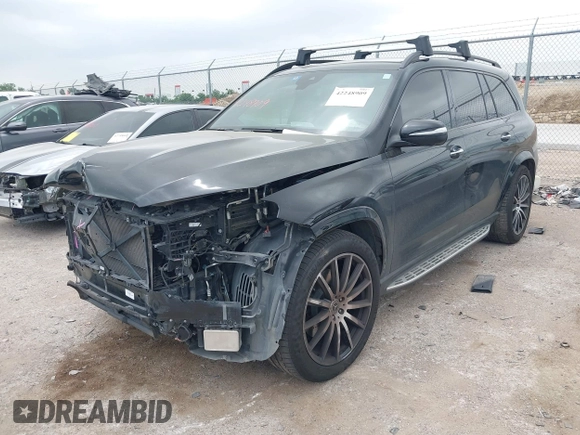 2023 Mercedes-Benz GLS 450 with VIN 4JGFF5KE6PA936445, listed as a IAAI auction lot 42248909 with 51,495 mi miles and . Bid and sale history available at DreamBid. Image 2.