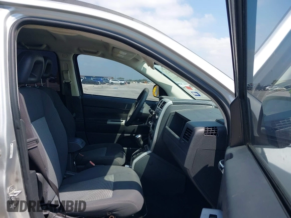 2008 Jeep Compass Sport with VIN 1J8FT47048D767281, listed as a IAAI auction lot 42010343 with 164,734 mi miles. Bid and sale history available at carsss.com. Image 5.