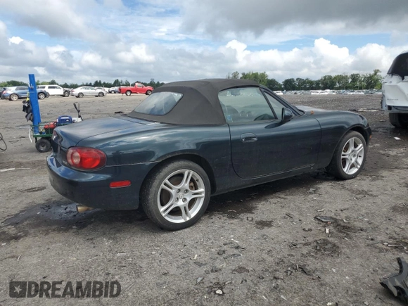 2005 Mazda MX-5 Miata LS with VIN JM1NB353X50410655, listed as a Copart auction lot 63337515 with 118,409 mi miles and Clean title. Bid and sale history available at DreamBid. Image 3.