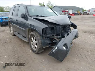 2007 GMC Envoy SLE z VIN 1GKDS13S572214421, wystawiony jako IAAI lot #42186747 z przebiegiem Nie podano mil oraz . Historia ofert i sprzedaży dostępna na DreamBid. Obrazek 1.