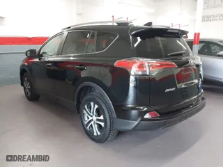 2017 Toyota RAV4 LE with VIN 2T3BFREV6HW598229, listed as a IAAI auction lot 41987566 with 82,871 mi miles. Bid and sale history available at carsss.com. Image 3.