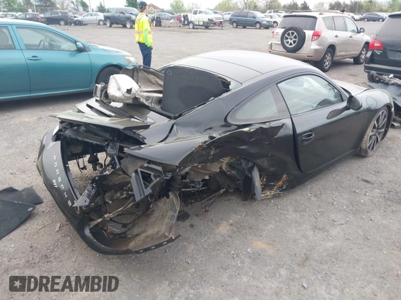 2014 Porsche 911 Carrera with VIN WP0AA2A92ES106536, listed as a IAAI auction lot 42048411 with 108,216 mi miles and . Bid and sale history available at DreamBid. Image 4.
