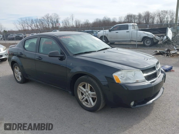 2009 Dodge Avenger SXT with VIN 1B3LC56B49N570157, listed as a IAAI auction lot 41796122 with 164,571 mi miles. Bid and sale history available at carsss.com. Image 1.