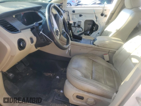 2016 Ford Taurus SEL with VIN 1FAHP2E95GG119915, listed as a Copart auction lot 88401305 with 96,486 mi miles and Salvage Title. Bid and sale history available at DreamBid. Image 7.