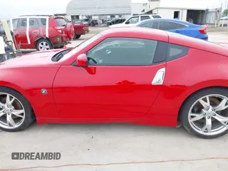 2009 Nissan 370Z Touring z VIN JN1AZ44E79M404171, wystawiony jako IAAI lot #41924058 z przebiegiem 75 940 mil mil oraz . Historia ofert i sprzedaży dostępna na DreamBid. Obrazek 14.