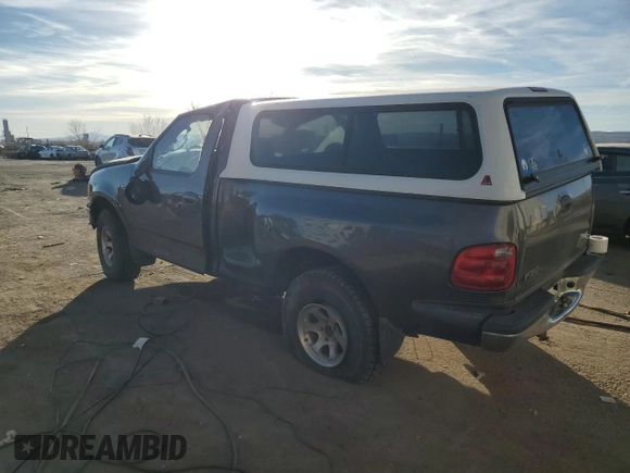 2003 Ford F-150 XL with VIN 1FTRF072X3KC94240, listed as a Copart auction lot 86130954 with 101,042 mi miles and Salvage title. Bid and sale history available at DreamBid. Image 2.