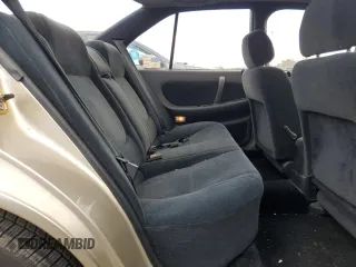 1990 Nissan Maxima z VIN JN1HJ01P8LT402950, wystawiony jako Copart lot #82714734 z przebiegiem 60 727 mil mil oraz Tytuł czysty. Historia ofert i sprzedaży dostępna na DreamBid. Obrazek 10.