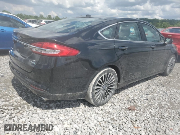 2018 Ford Fusion SE z VIN 3FA6P0LU6JR273861, wystawiony jako Copart lot #55722005 z przebiegiem 127 633 mil mil oraz Szkoda całkowita • Salvage title. Historia ofert i sprzedaży dostępna na DreamBid. Obrazek 3.