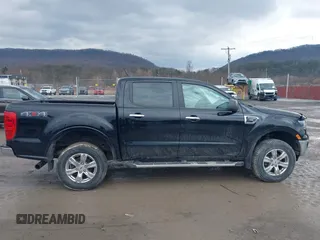 2021 Ford Ranger XL with VIN 1FTER4FH6MLD42153, listed as a IAAI auction lot 41650522 with 77,156 mi miles and . Bid and sale history available at DreamBid. Image 13.