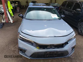 2022 Honda Civic Si with VIN 2HGFE1E52NH474042, listed as a IAAI auction lot 42099415 with 26,828 mi miles and . Bid and sale history available at DreamBid. Image 12.