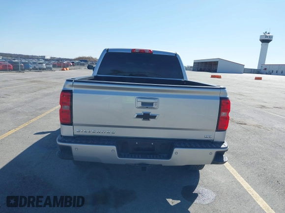 2014 Chevrolet Silverado 1500 LTZ with VIN 3GCUKSEC8EG355088, listed as a IAAI auction lot 41979592 with 209,733 mi miles and . Bid and sale history available at DreamBid. Image 17.