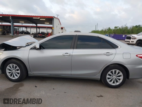2015 Toyota Camry XLE with VIN 4T1BF1FK8FU915410, listed as a IAAI auction lot 41953451 with 145,924 mi miles and . Bid and sale history available at DreamBid. Image 14.