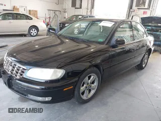 1997 Cadillac Catera z VIN W06VR54R9VR162389, wystawiony jako IAAI lot #40142990 z przebiegiem 111 558 mil mil oraz . Historia ofert i sprzedaży dostępna na DreamBid. Obrazek 2.