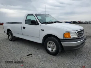 2004 Ford F-150 XL with VIN 2FTRF17234CA32622, listed as a Copart auction lot 53158095 with 217,728 mi miles and Salvage title. Bid and sale history available at DreamBid. Image 4.