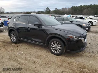 2023 Mazda CX-5 2.5 S Select Package with VIN JM3KFBBMXP0169625, listed as a Copart auction lot 47581455 with 69,191 mi miles and Salvage Title. Bid and sale history available at carsss.com. Image 4.