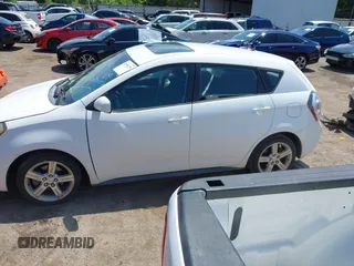 2010 Pontiac Vibe 1SB with VIN 5Y2SL6E04AZ404492, listed as a IAAI auction lot 42496299 with 162,858 mi miles and . Bid and sale history available at DreamBid. Image 14.