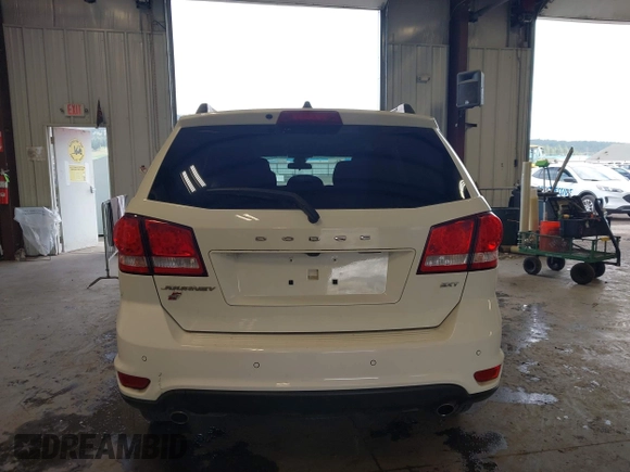2018 Dodge Journey SXT with VIN 3C4PDDBGXJT469945, listed as a IAAI auction lot 42266310 with 121,871 mi miles and . Bid and sale history available at DreamBid. Image 16.