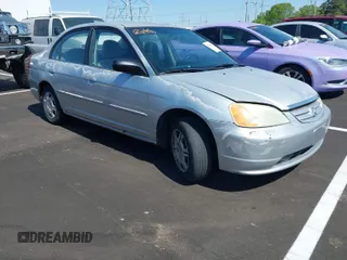 2002 Honda Civic LX with VIN 2HGES155X2H602754, listed as a IAAI auction lot 42034774 with 219,751 mi miles. Bid and sale history available at carsss.com. Image 1.