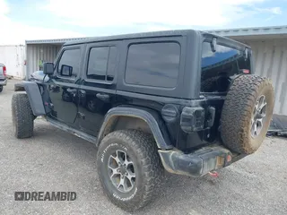 2022 Jeep Wrangler Unlimited Rubicon with VIN 1C4HJXFN2NW134024, listed as a IAAI auction lot 42248188 with 41,899 mi miles and . Bid and sale history available at DreamBid. Image 3.