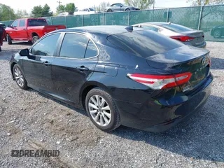2019 Toyota Camry LE with VIN 4T1B11HK1KU718374, listed as a IAAI auction lot 42071905 with 86,460 mi miles and . Bid and sale history available at DreamBid. Image 3.