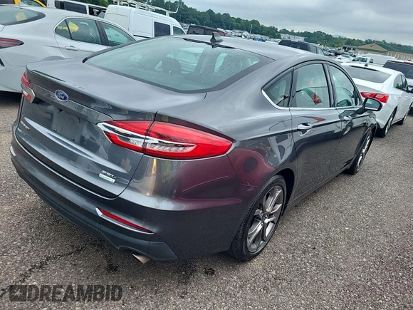 2020 Ford Fusion SEL with VIN 3FA6P0CD7LR197568, listed as a IAAI auction lot 42725343 with 111,304 mi miles and . Bid and sale history available at DreamBid. Image 15.