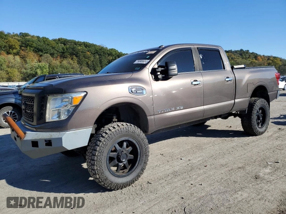 2016 Nissan Titan XD PRO-4X with VIN 1N6BA1F4XGN502630, listed as a Copart auction lot 75690604 with 183,158 mi miles and Clean Title. Bid and sale history available at carsss.com. Image 1.